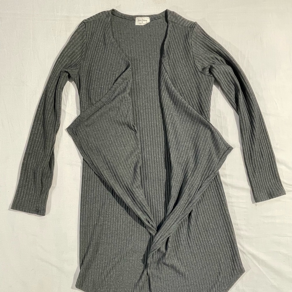 Tree kisses cardigan.